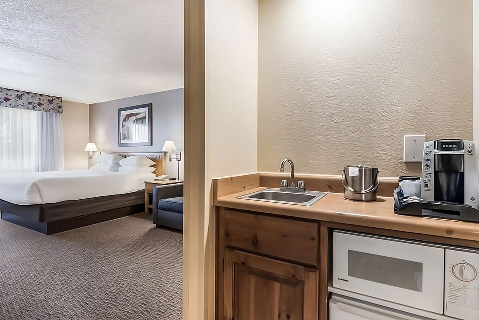 Start mornings with in-room coffee, microwave, and handy sink.