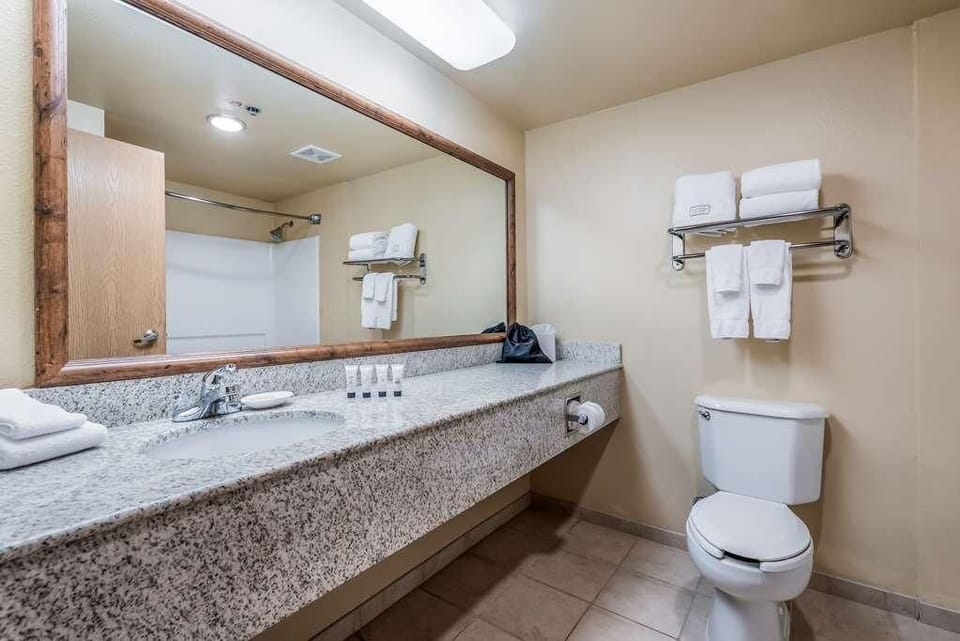 Get ready with a wide vanity and fresh towels stocked.