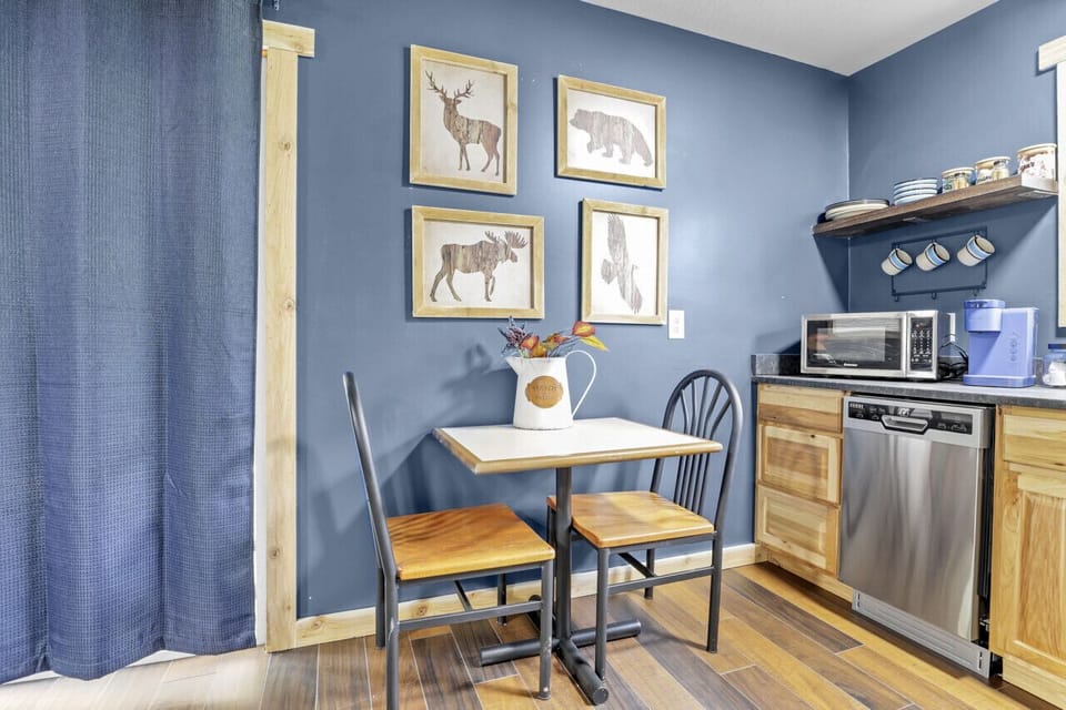 Kitchen table, dishwasher, microwave, coffee maker