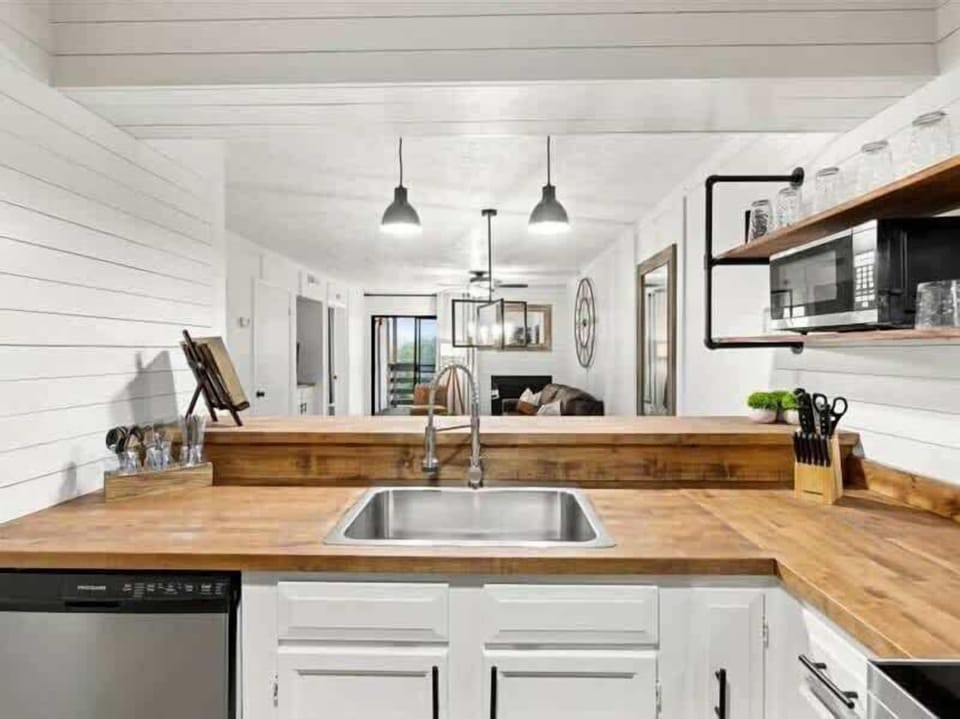Bright and stylish space with modern appliances and inviting wooden accents!