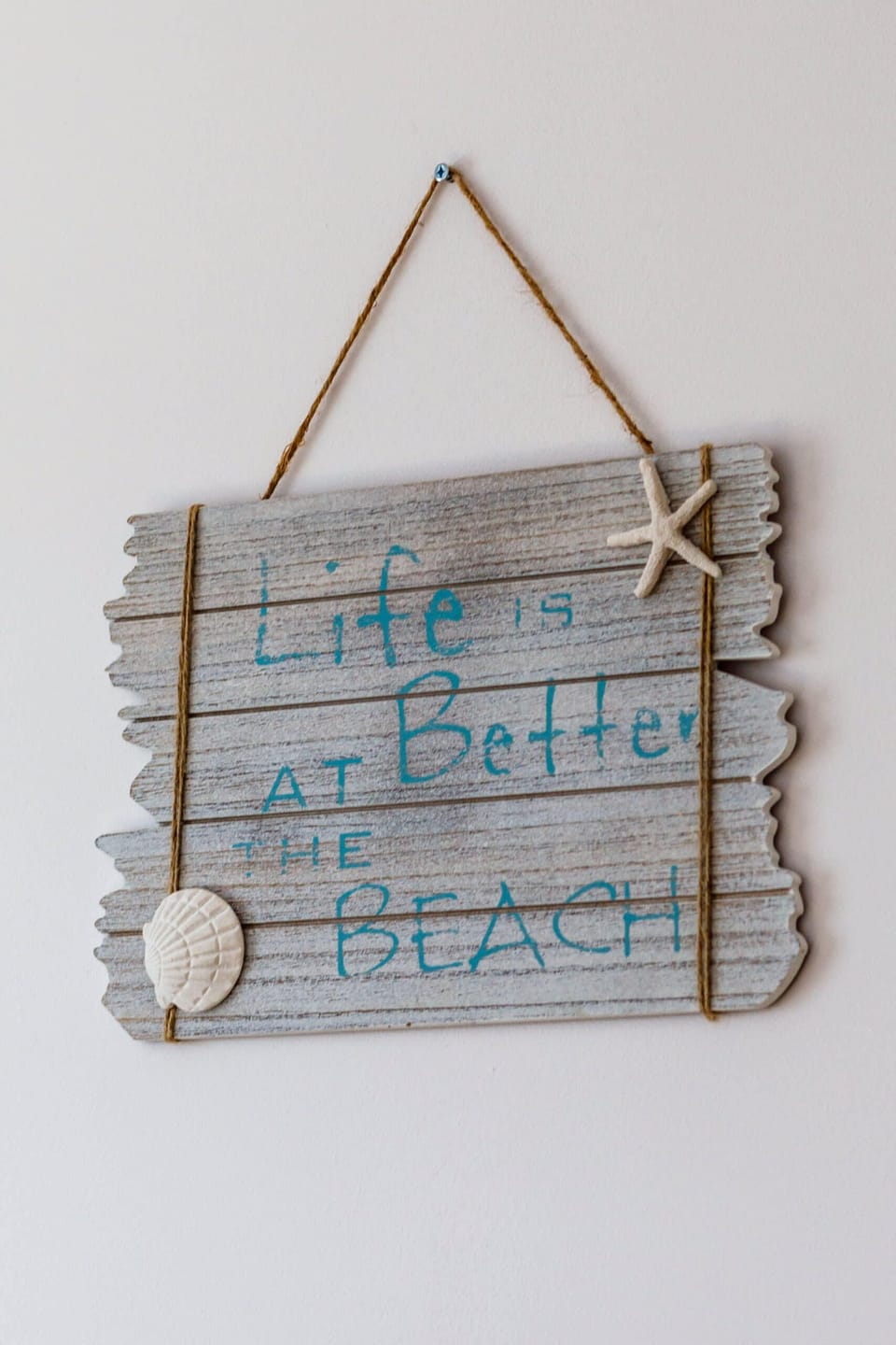 A creative wall hanging with inspirational text. Adds personality and warmth to the home.