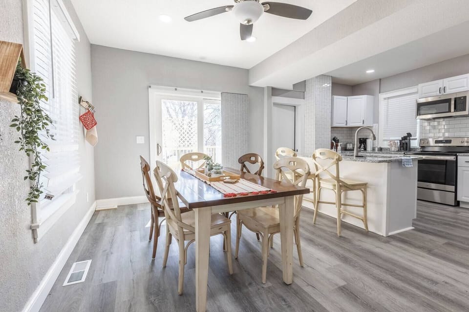 Gather around the large, open, kitchen and dining room area.
