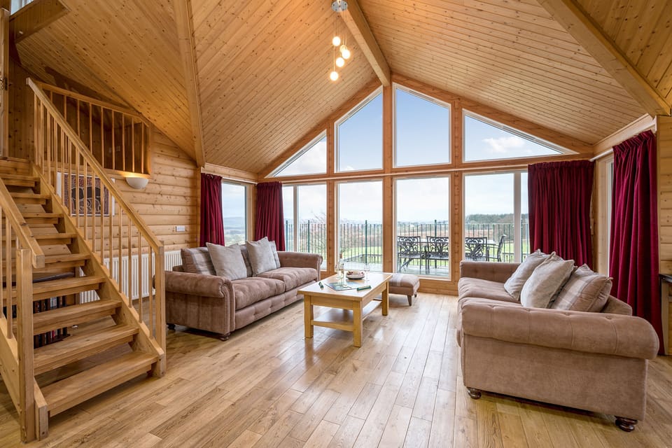 Living area with stairs to Studio Bedroom