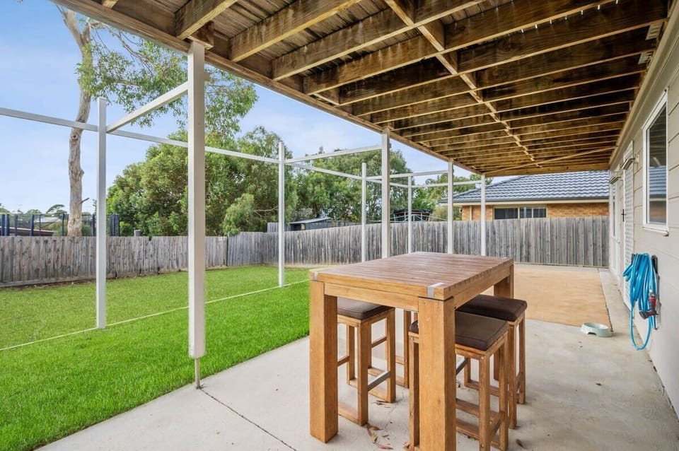 The rumpus room opens onto the lower deck and backyard