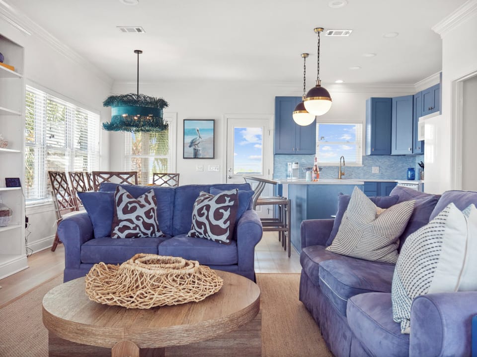 Spacious living rm with ocean views, satellite television & high-speed internet.