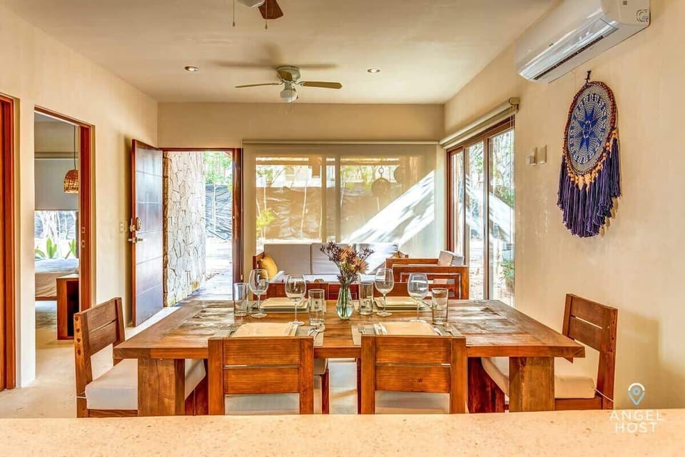 The wood touches make the space including the hand-made dining table for 6
