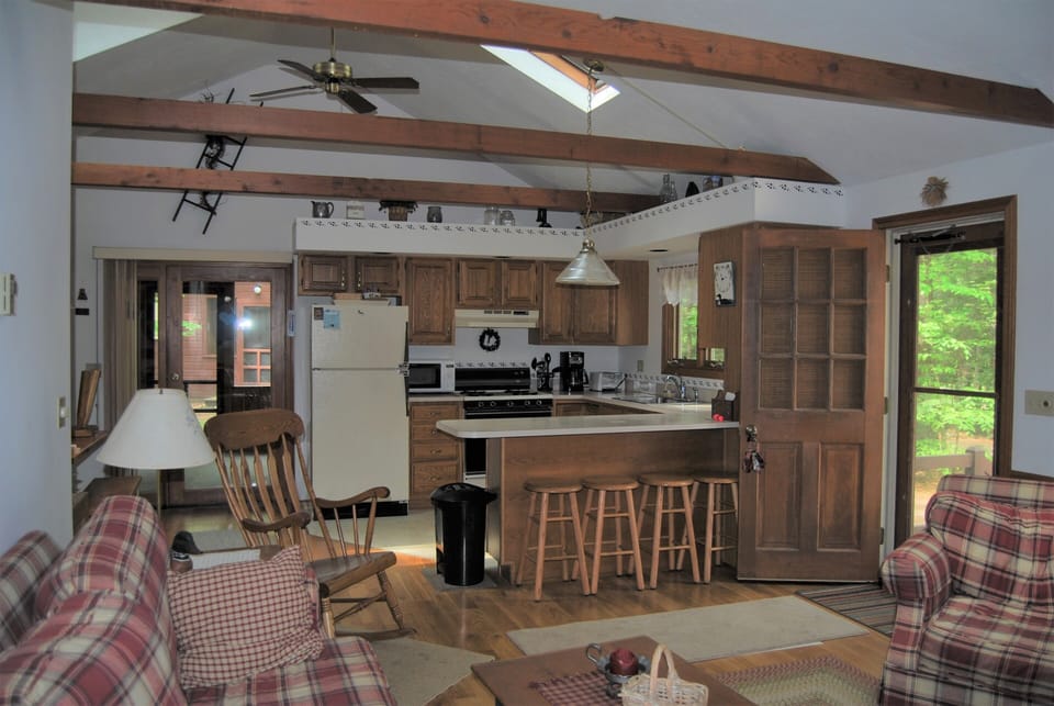 Cathedral ceiling living room / dining room / kitchen