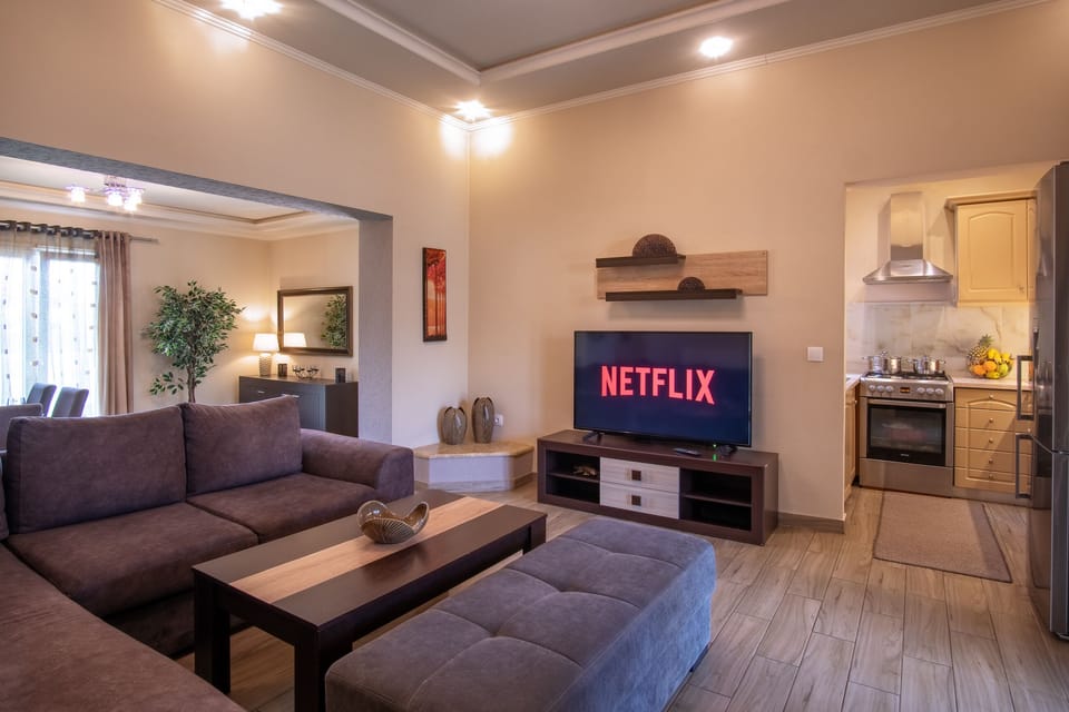 Star Jasmine House Acharavi-Living Room 