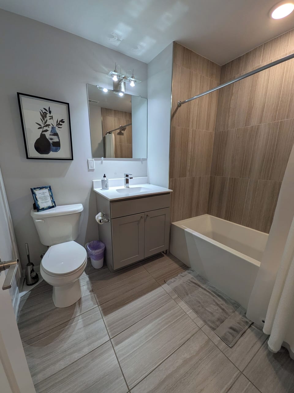 Guest bathroom in hallway. Lower level.