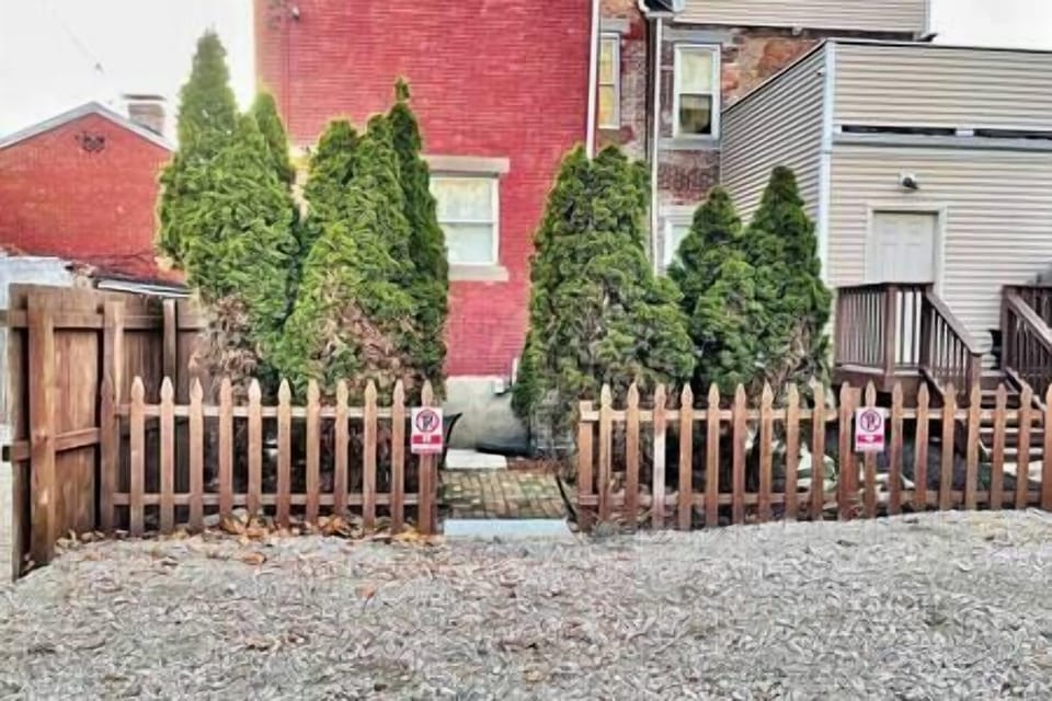 Private lot with off street parking for one vehicle is so convenient in the North Side. 