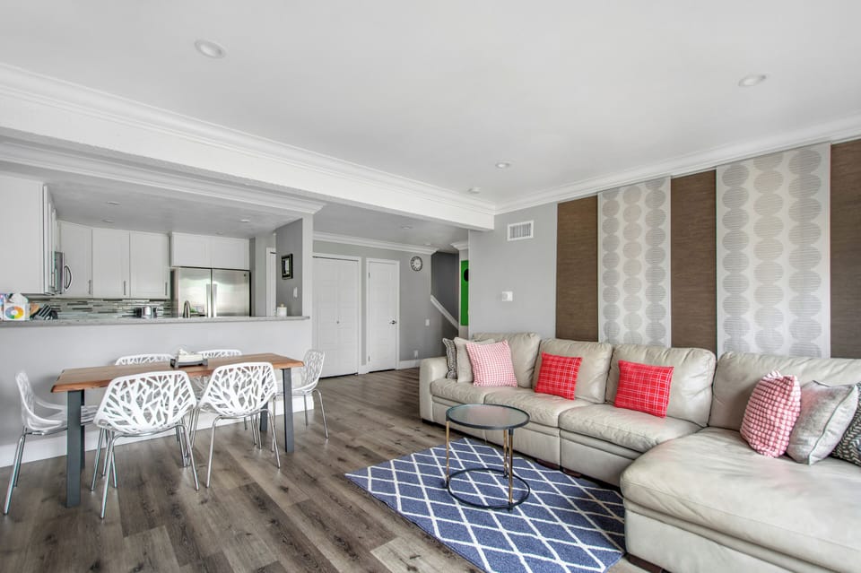 Living room with L shape leather couch & chaise