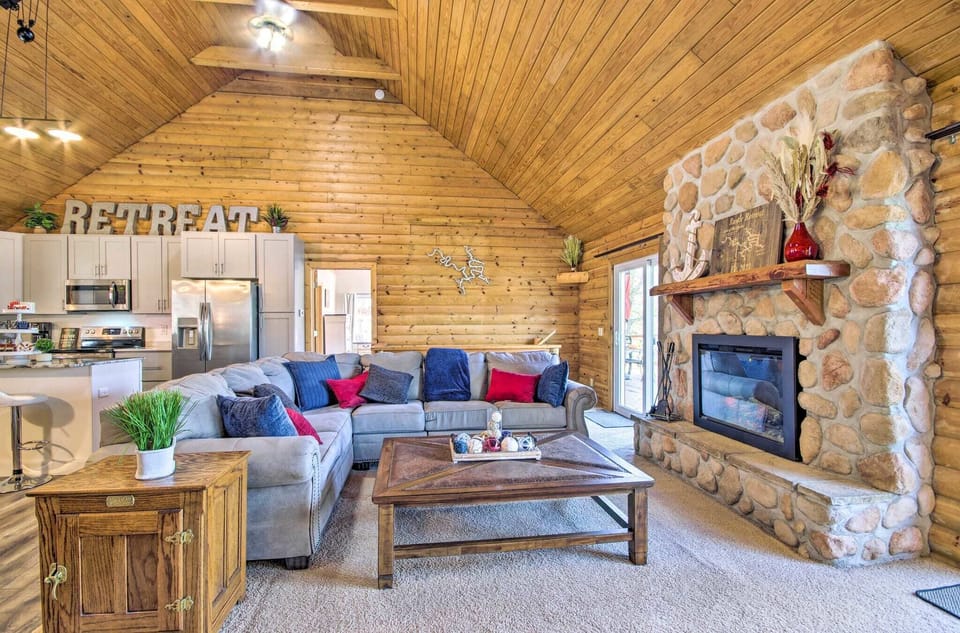 Snuggle up on couch as you enjoy the electric fireplace.