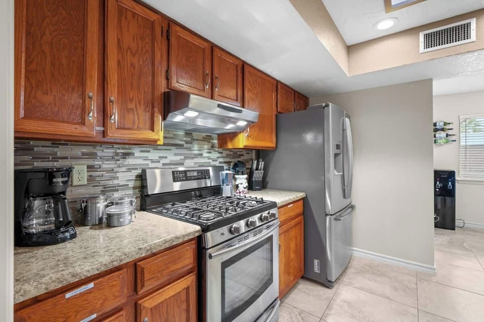Kitchen with coffee maker and coffee