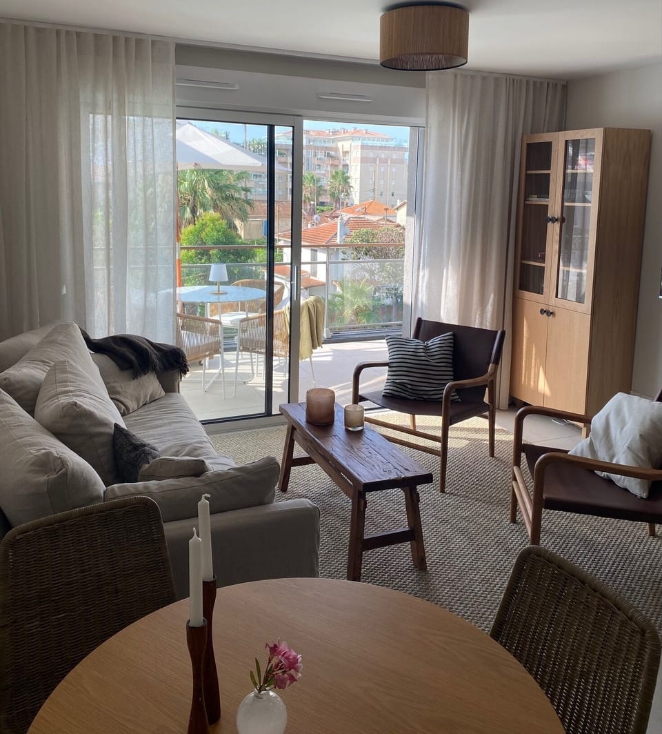 The living room with access to the balcony
