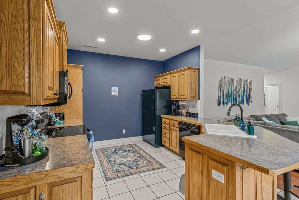 Cook like a pro in the fully stocked kitchen—stainless appliances, drip & Keurig coffee makers, plentiful cookware and spacious counters.