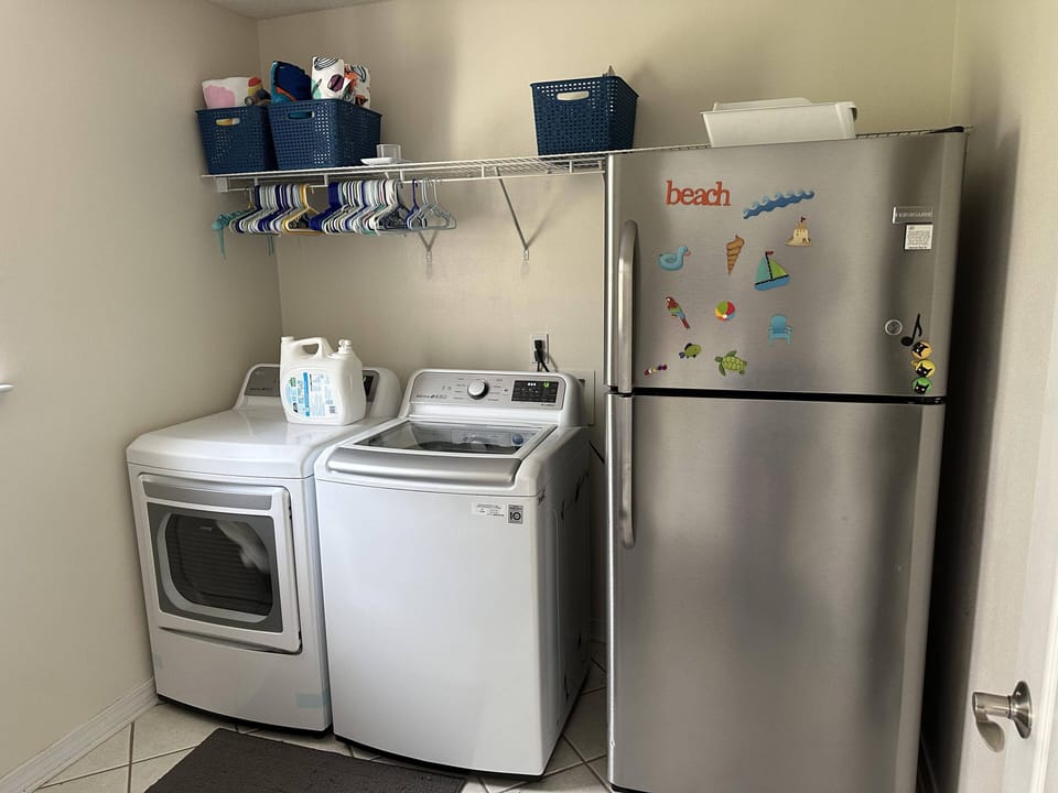 Laundry room comes fully stocked with beach towels and laundry soap