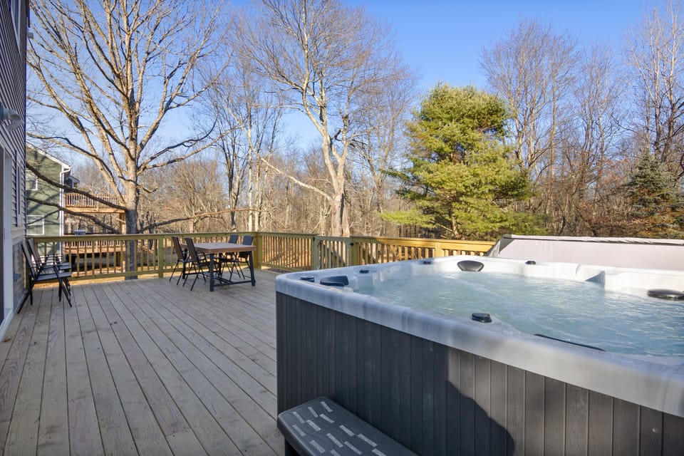 Outdoor deck with hot tub, and seating