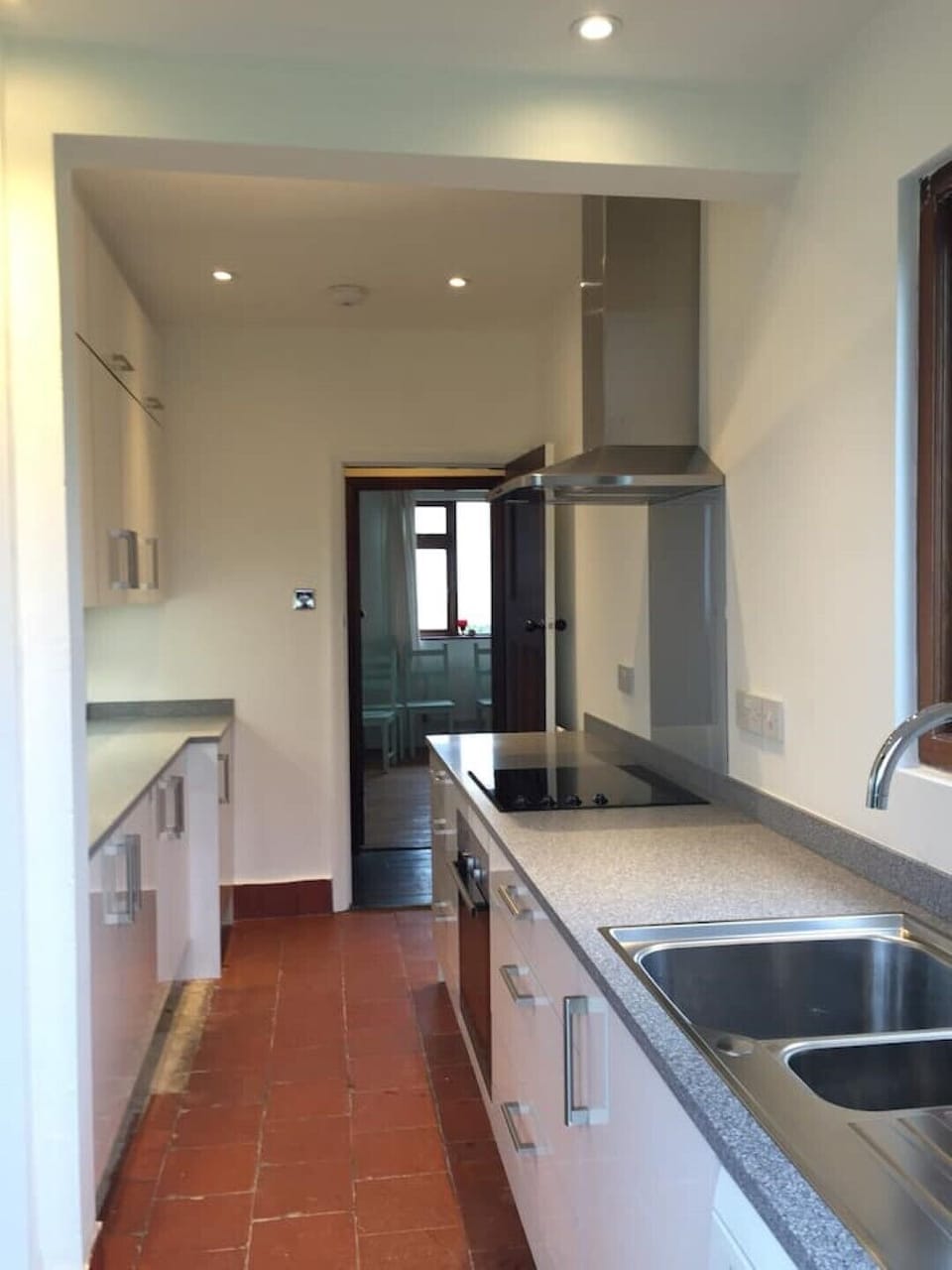 The kitchen at the back of the house overlooking fields.   