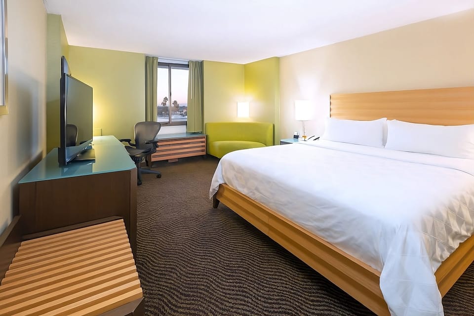 Stretch out on crisp linens and enjoy a calm city outlook.