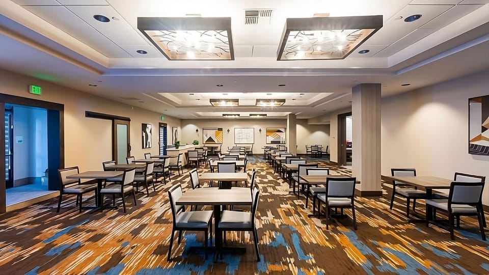 Host productive meetings in a spacious, well-lit setup.
