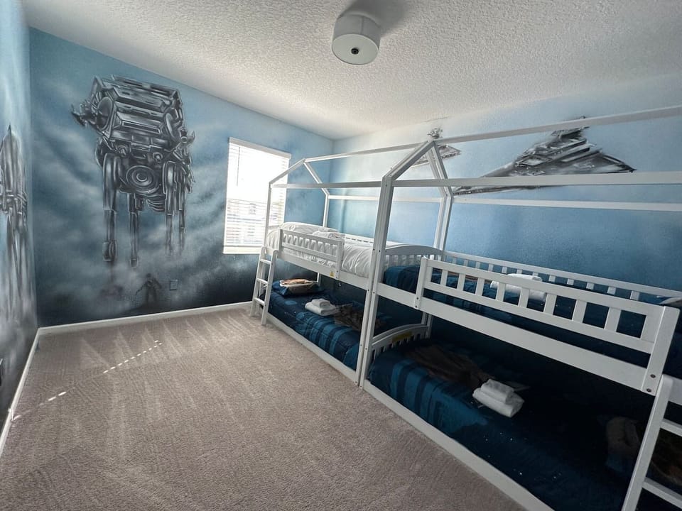 Star Wars-themed room with custom bunk beds, built for kids and teens.