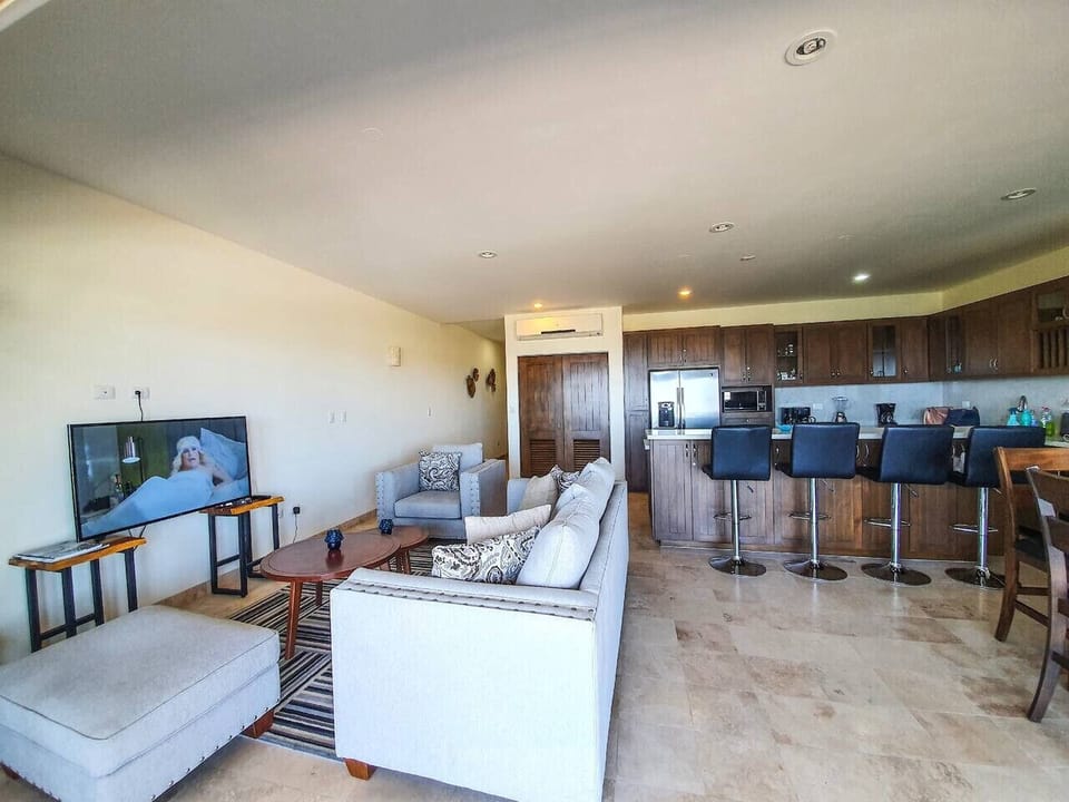 Unwind and relax in this spacious and stylish living room, perfect for downtime.