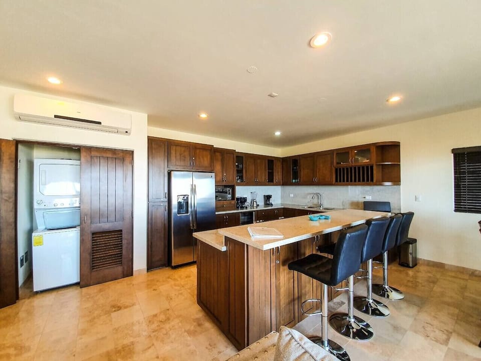 Prepare your favorite meals with ease in this fully equipped kitchen.