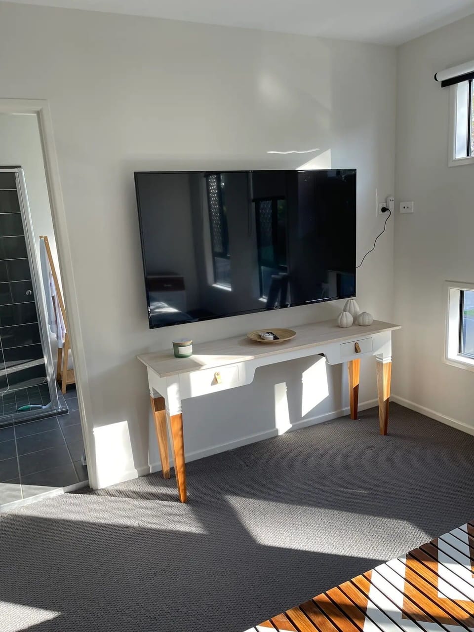 70" Smart TV in main bedroom