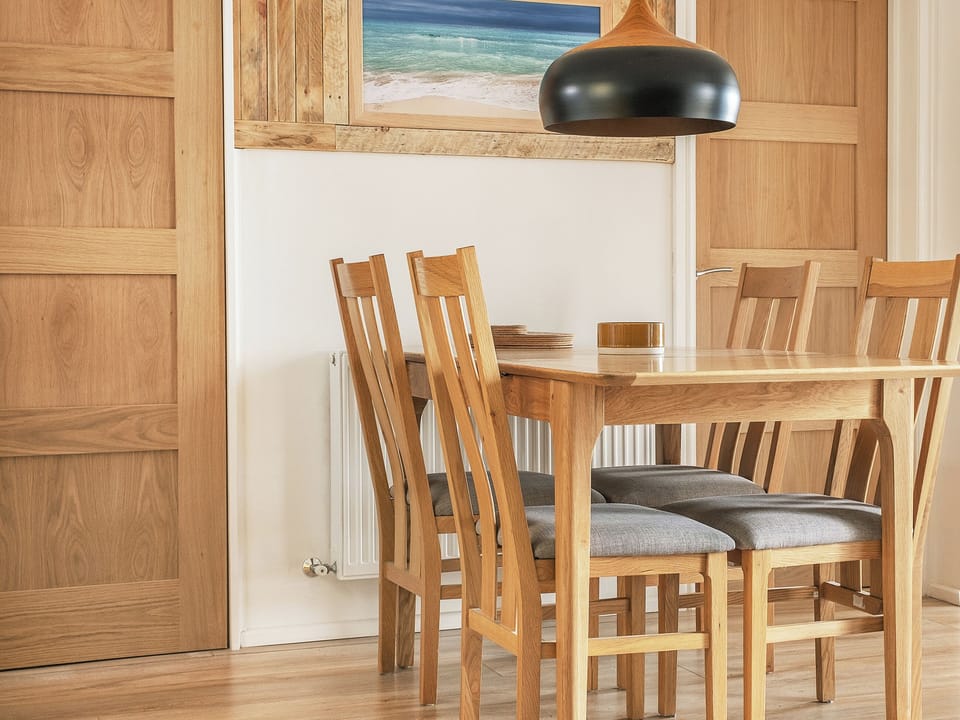 The oak dinning table and chairs, seats four comfortably | Old Quay, Newlyn