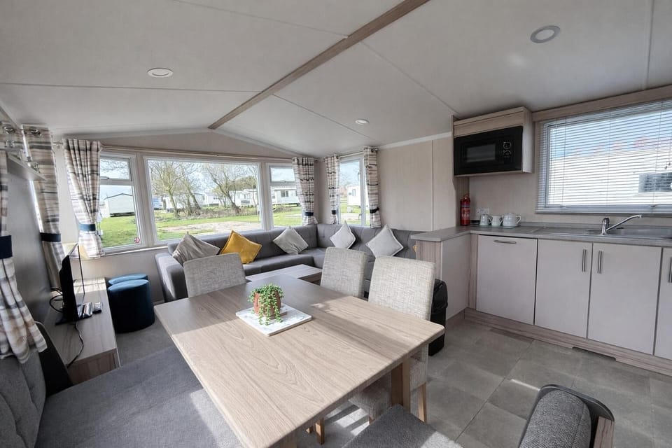 This inviting space makes our dog-friendly caravan the ideal retreat for unwinding together.