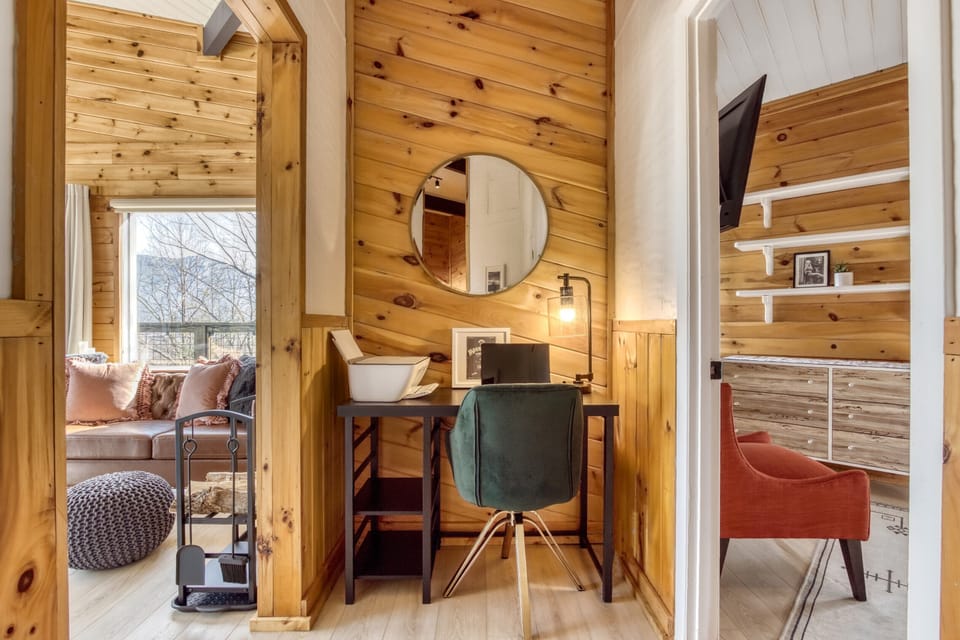 Workspace.  Living room to left, main level bedroom on right