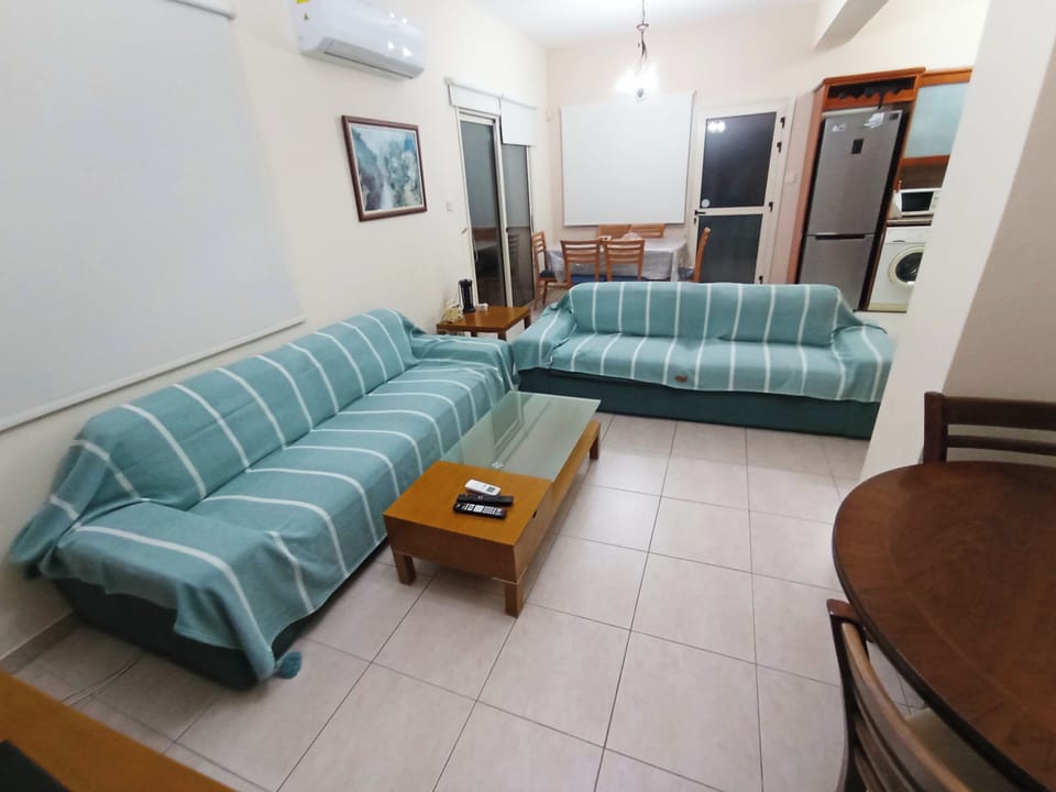 Living room and working table on the right. 