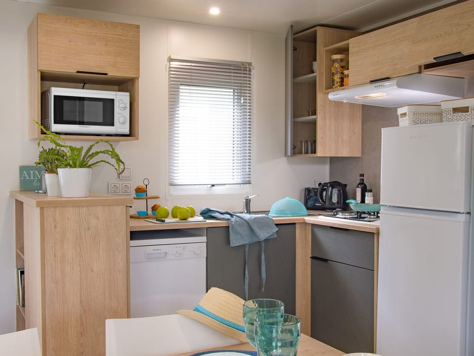 Modern kitchen with full amenities, making it easy to prepare and enjoy meals during your stay.