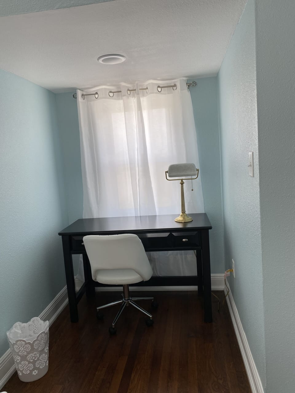 Dedicated work space with desk and office chair