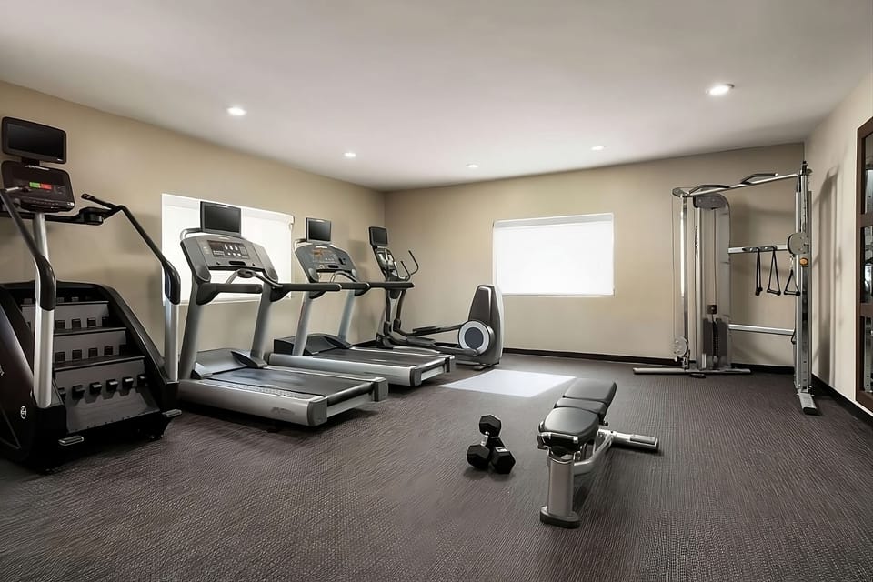 Recharge with a full cardio session in the bright fitness room.