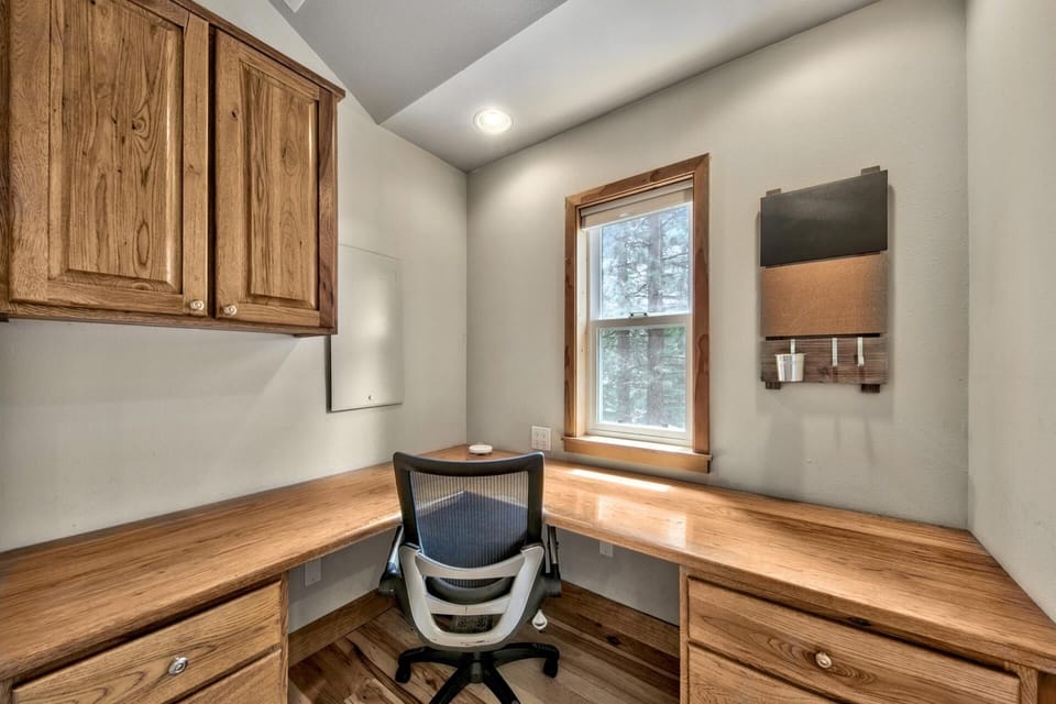 Main level, large workspace - The perfect space to get some work done, complete with desk and chair, located on the main floor