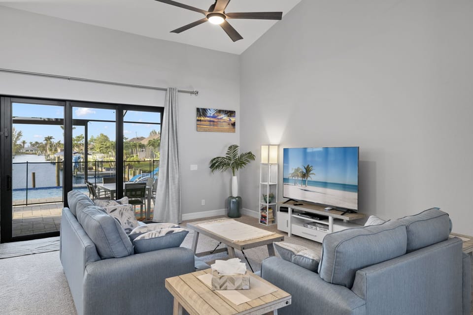 Living Room - TV, Patio+ Pool Access