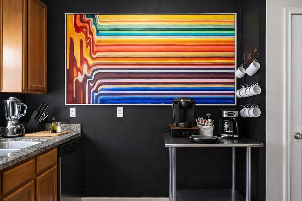 Fully equipped kitchen with stocked coffee station