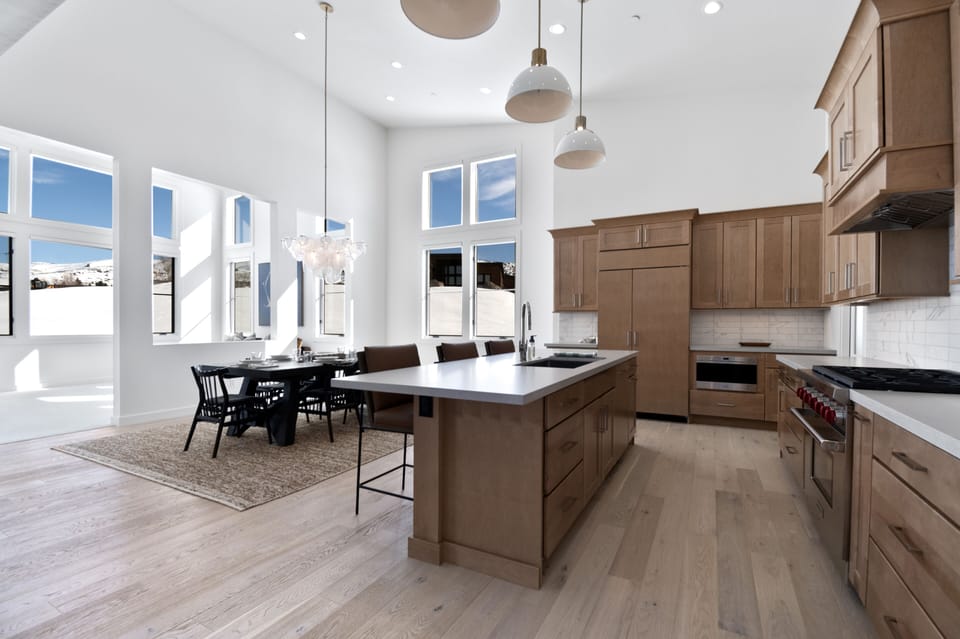 A chefs kitchen with sub-zero refrigerator, Wolf Range and many other amenities are included.  Dining Room has seating for 6 plus 3 additional bar stool seats at the island