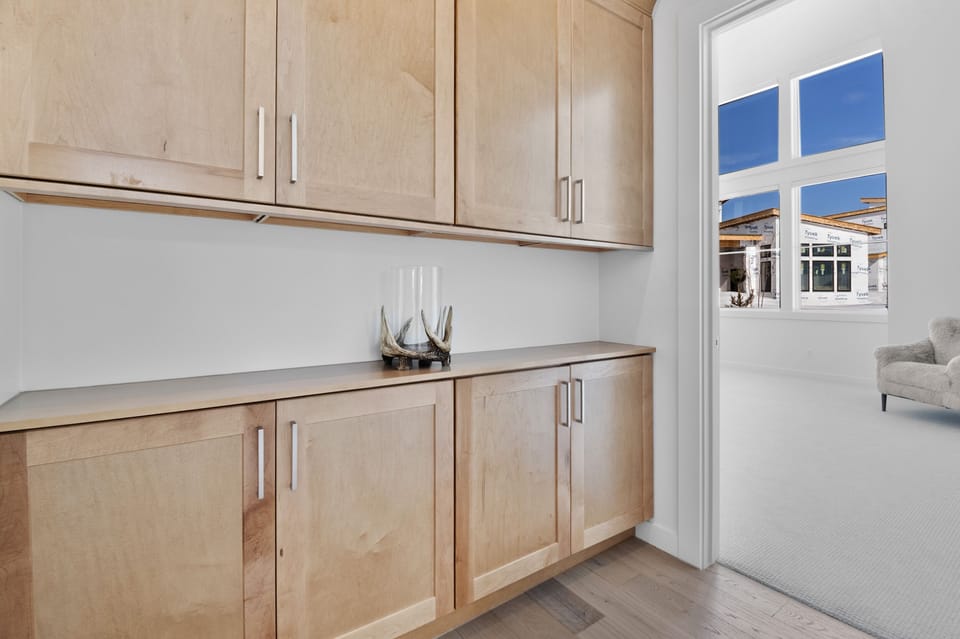 Just off the guest room is beautiful cabinetry for any of your storage needs