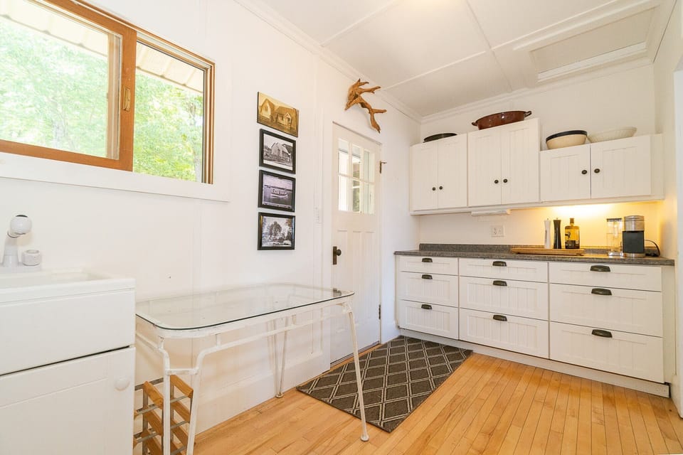 Pantry off the kitchen with additional prep space and Laundry Sink.