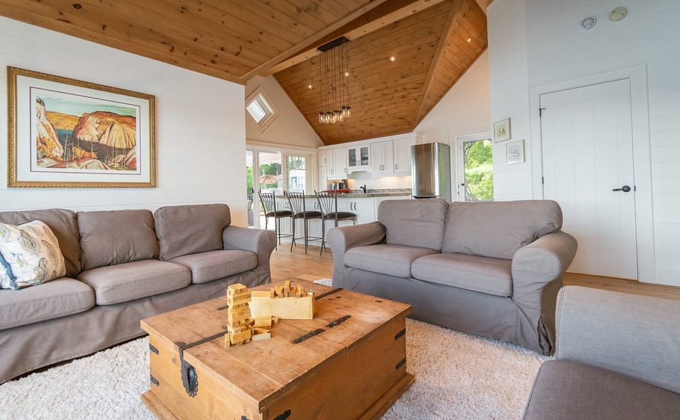 The family room in the boat house is open to the entertainer's kitchen.