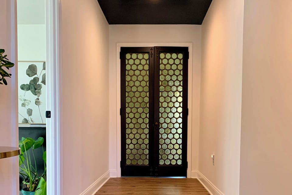 The vintage stained glass doors were the inspiration for the whole house! You'll see circles everywhere 