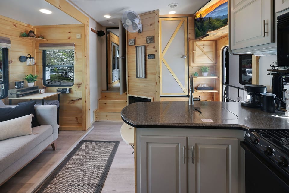 Living space is connected to the kitchen. AC can be adjusted for your comfort.