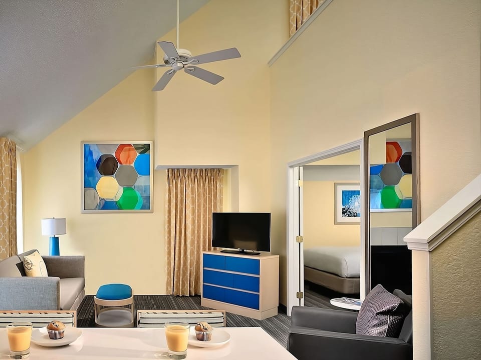 Spread out in the lofty living area with modern comforts.