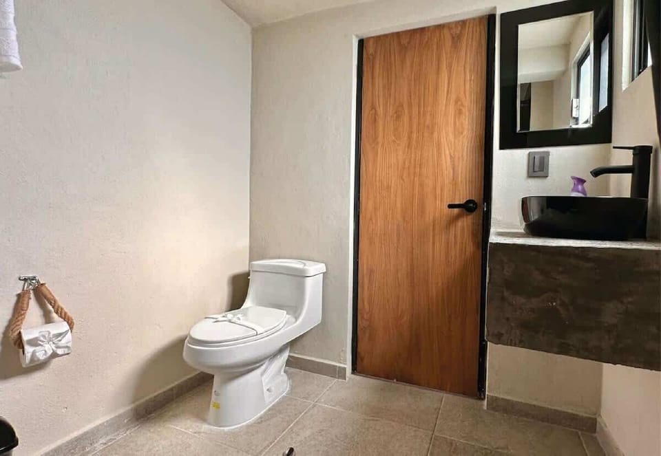 Bathroom with toilet and vanity