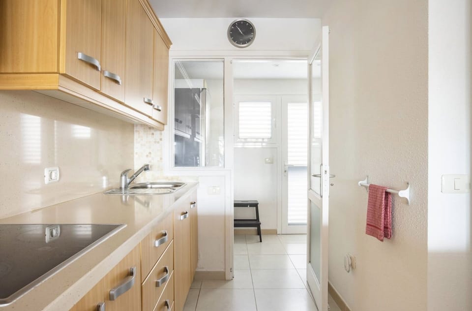 Kitchen looking out to utility room