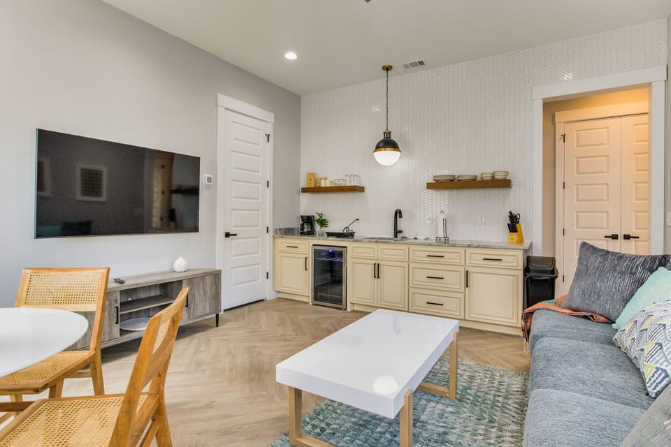 The downstairs kitchen and dinette provide all the essentials for a comfortable stay.