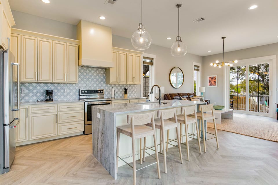 Prepare delicious meals in our fully-equipped kitchen with an island.