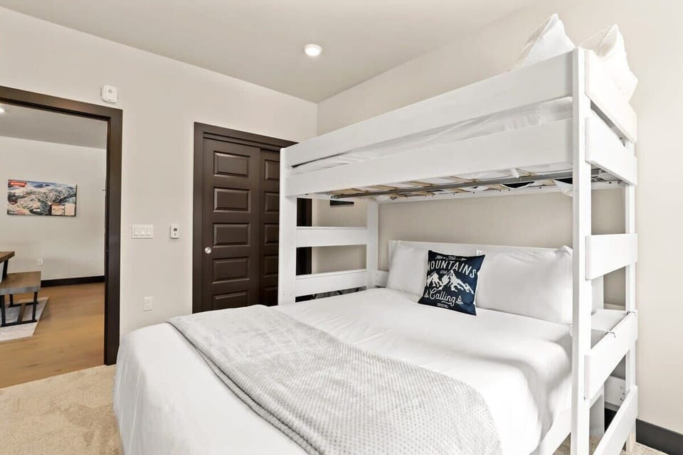 The guest bedroom is a great space for families traveling with children as it has a bunk bed with a twin-over-queen bed in the room and a large closet.
